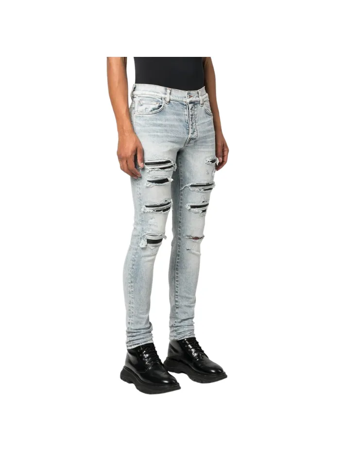 AMIRI distressed skinny jeans