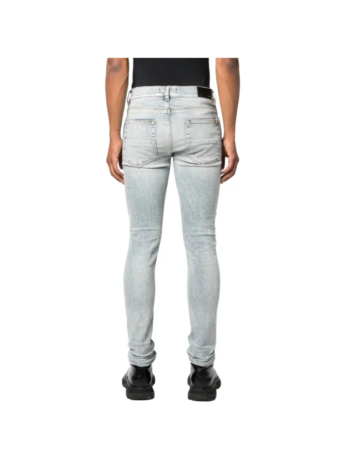 AMIRI distressed skinny jeans