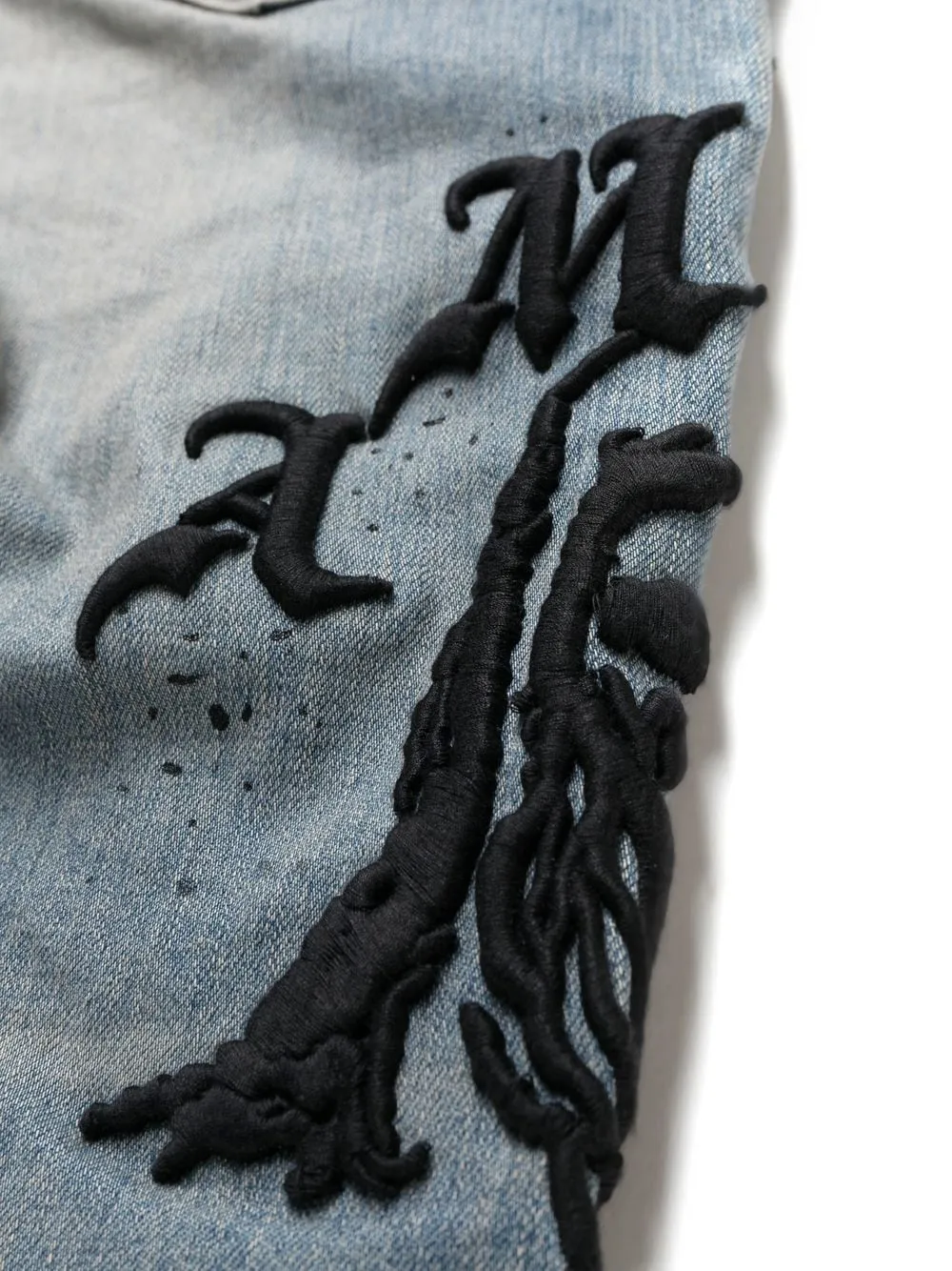 AMIRI logo-embroidered skinny jeans