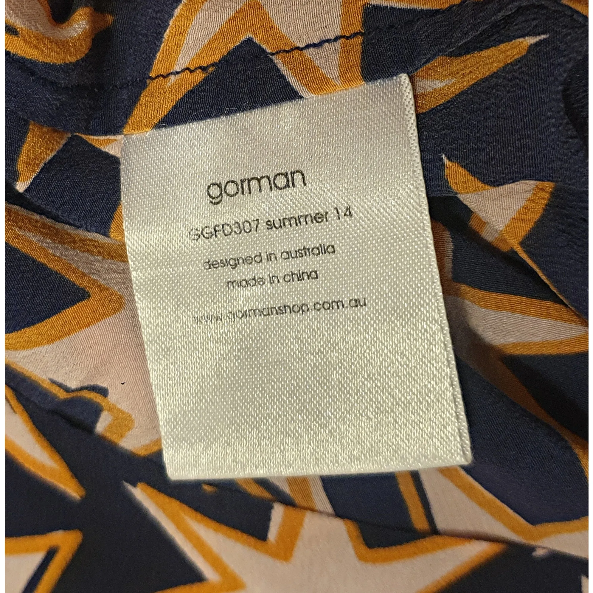 Gorman navy 100% silk skirt with pink and orange star print fits size 12