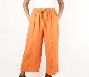 Jericho Road peachy orange wide leg pants with fun scalloping detail size 10