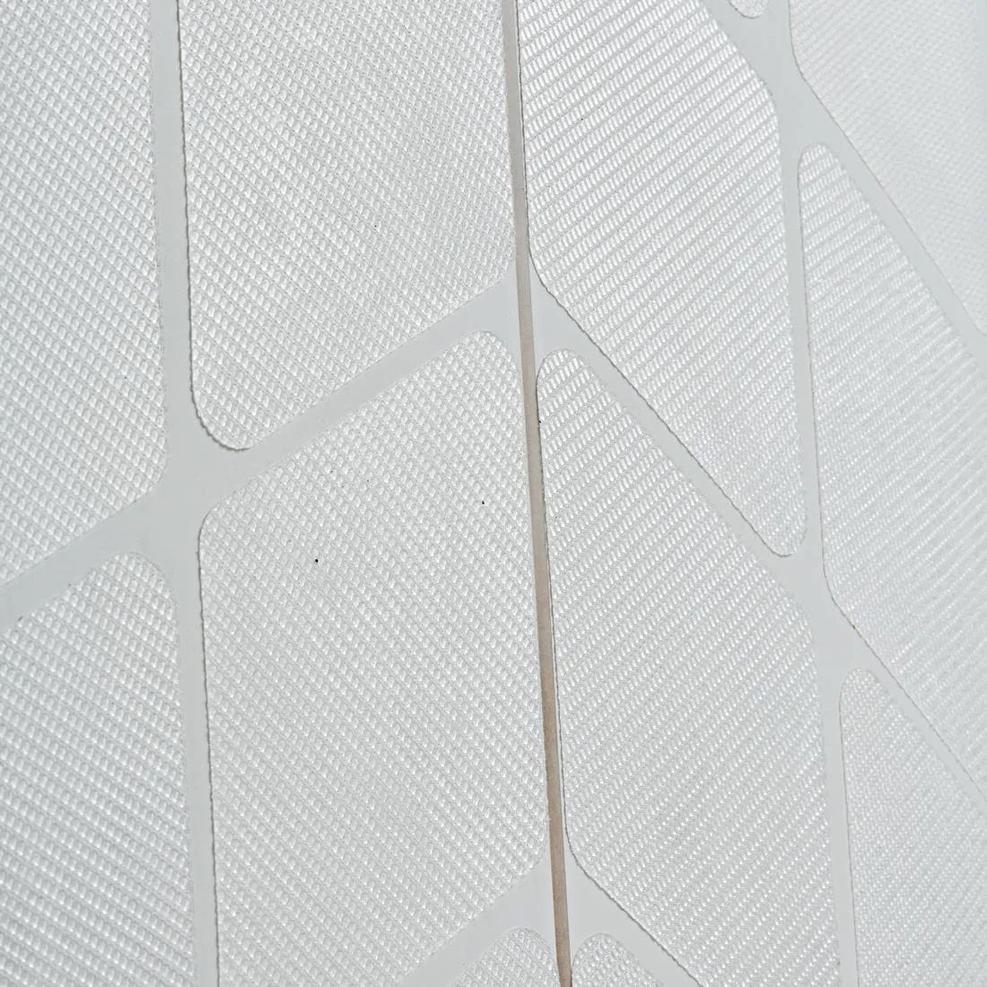 kit antidérapant  PAD NOWAX pour planches de surf en résine.
