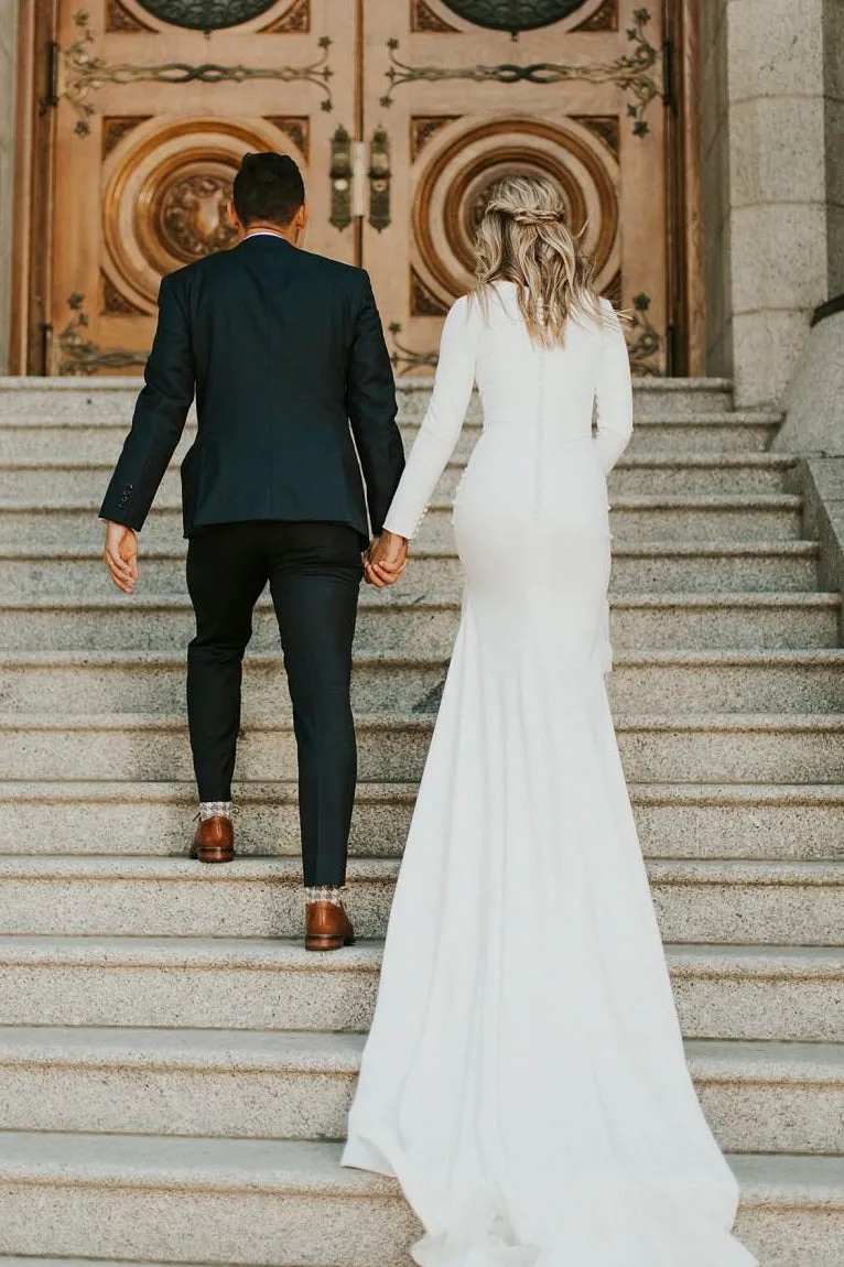 Modest Long Sleeve Satin Wedding Gown With Cathedral Train And Buttons-715717